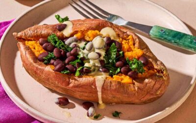 Stuffed Sweet Potatoes with Spiced Black Beans & Lime Crema